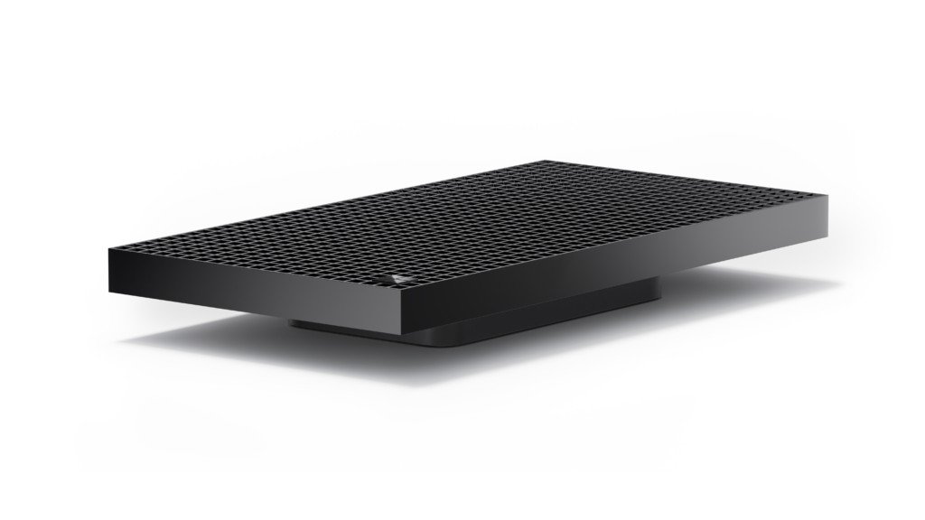 Render of the low, flat black Surface RTX Spark Dev Box with a perforated grid top, floating on a white background